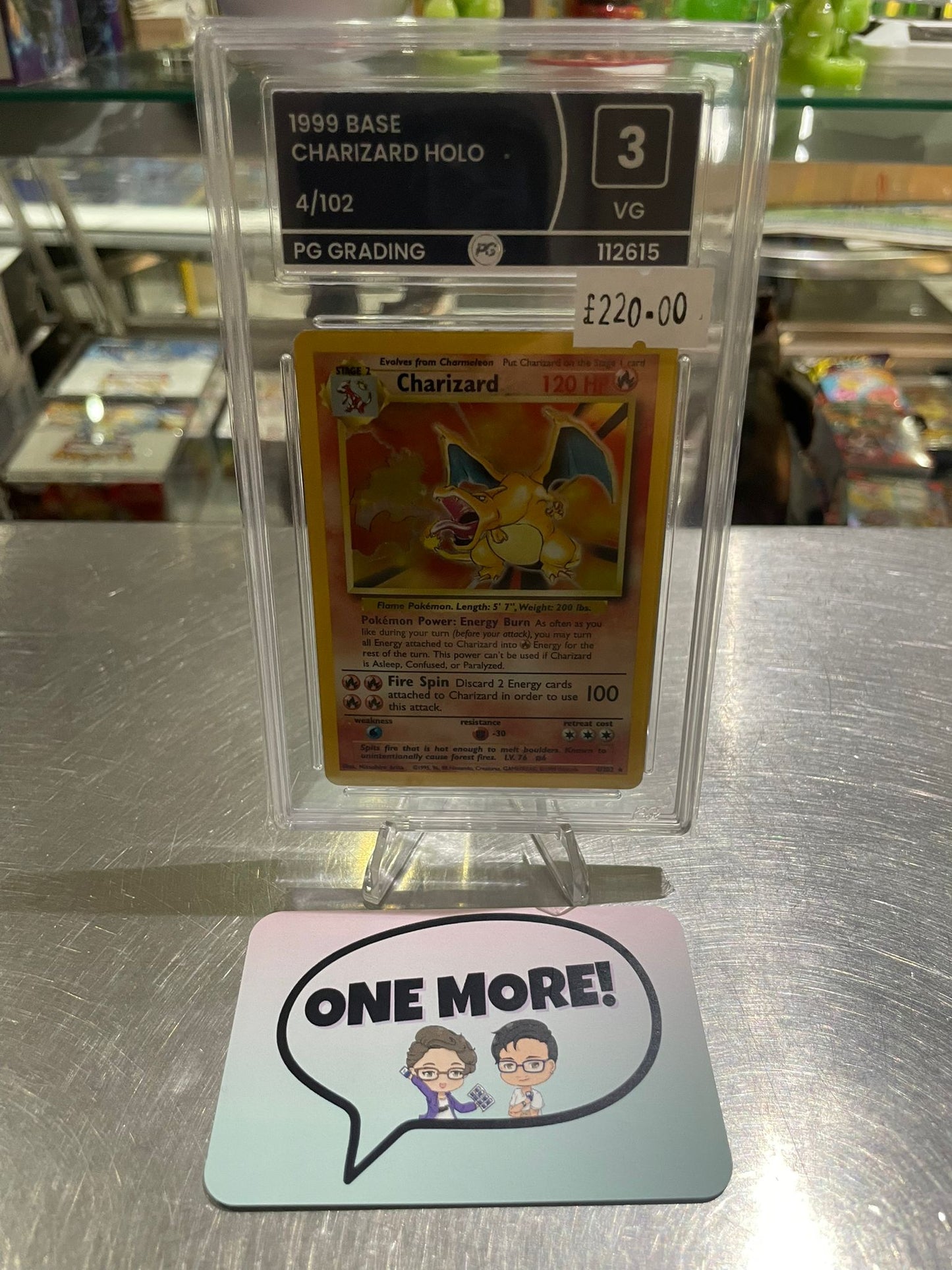 Pokemon TCG: 1999 Charizard Base Holo PG Grade 3