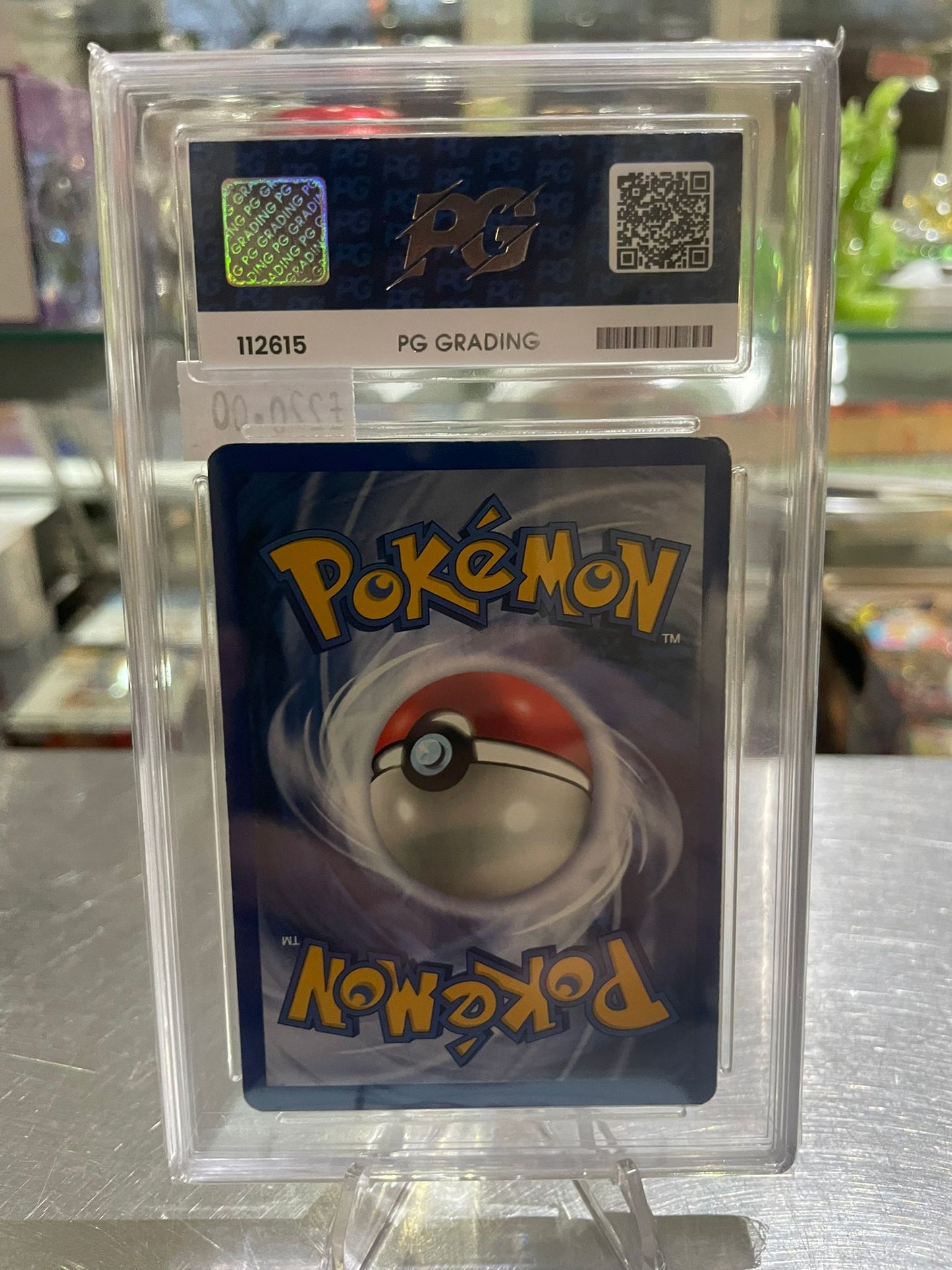 Pokemon TCG: 1999 Charizard Base Holo PG Grade 3